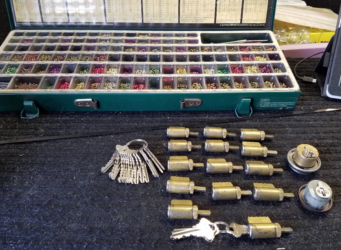 Locks and pins for rekeying locks